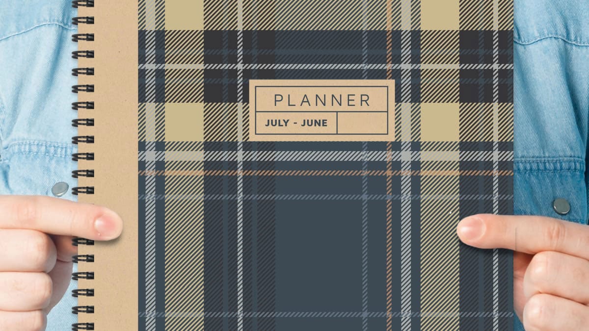 Person holding a planner